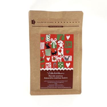 Herkullinen amaretto-suklaa-kahvi punavihreällä jouluisella etiketillä ja tekstillä "Hyvää joulua" ja "Hau! mou!". Valmistettu Suomessa.